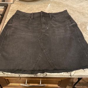 Classic distressed black mini skirt